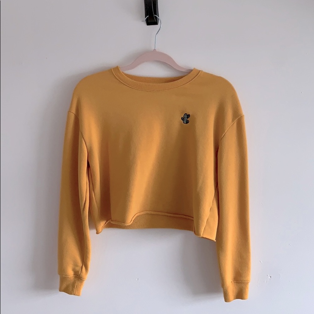 Cropped yellow sweater with cactus embroidery